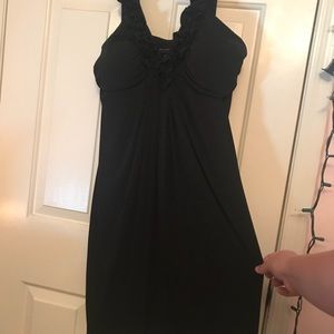 Simple black dress with floral strap detail